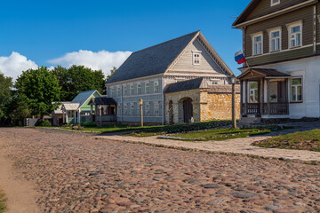 View of historical merchant buildings of estates on the main street of Izborsk Pechorskaya Street...