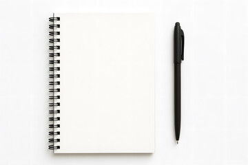 A top view of a blank notebook with spiral binding and a black pen on a white background surface