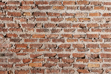 Old clay brick wall texture