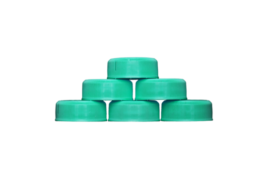 Six green plastic bottle caps arranged in a pyramid are isolated.