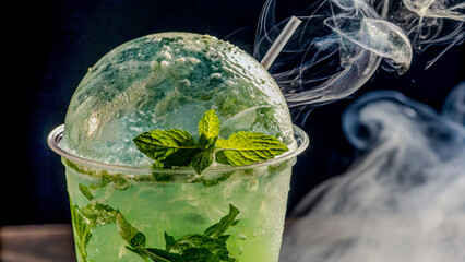 Minty Drink Inside a Transparent Planet with Cool Vapor Rising