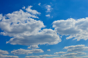 blue sky filled with soft fluffy cumulus clouds sunny day white peaceful backgrounds designs nature weather forecast travel backdrops cloudscape skyscape meteorology air pollution eco-friendly