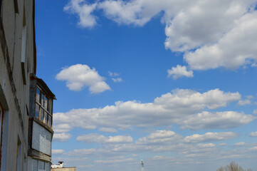 blue sky filled with soft fluffy cumulus clouds sunny day white peaceful backgrounds designs nature...