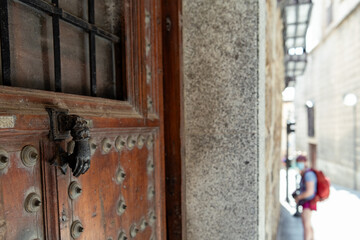 Traveler admiring historic street with charming architectural details