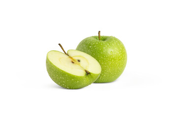 Fresh green apple with water droplets and a half isolated 