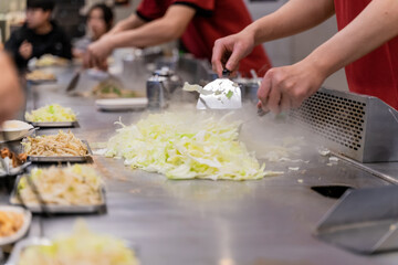 Cabbage teppanyaki is a comforting and flavorful dish that highlights the natural sweetness and crunch of fresh cabbage. Cooked on a sizzling iron plate, the leaves are charred just enough to release