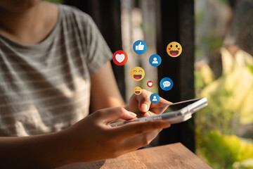 Social Distancing ,Working From Home concept..The concept of living on vacation and playing social media. Social media and digital online concept, man using smart phone with Social media..