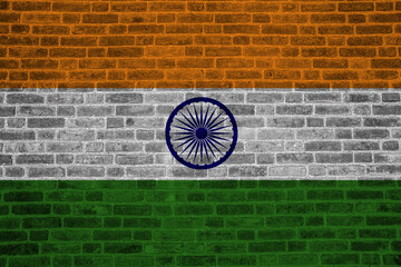 Flag of India painted onto a grunge brick wall. India national day August 15th.