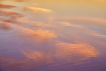 Pastel Clouds Reflected in Calm Water