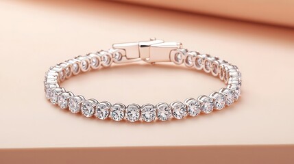 Fototapeta premium Dainty handcrafted tennis bracelet with round diamonds in a teardrop arrangement, isolated on a light peach surface