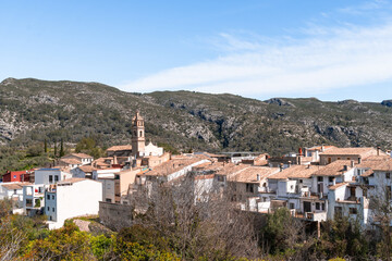 Obraz premium a view of a village in the mountains .La vall de gallinera, Alicante, Spain