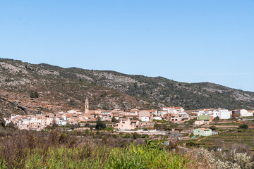 Obraz premium a view of a village in the mountains .La vall de gallinera, Alicante, Spain