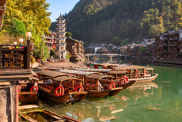 Fenghuang ancient town, China. Traditional chinese wooden houses in old watertown
