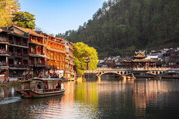 Fenghuang old town on water. Traditional chinese architecture
