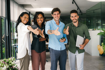 Group of busy happy diverse professional business team people working in office using digital tablet