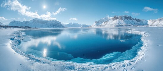 Fototapeta premium Arctic Lake with Ice, Mountains, and Sunny Sky