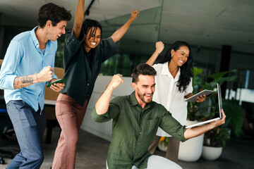 Group of busy happy diverse professional business team people working in office using digital tablet