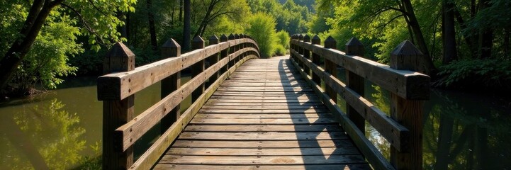 Obraz premium Weathered wooden bridge spanning a murky river, rickety, grunge, weathered