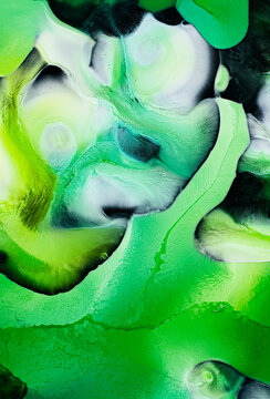 Abstract green liquids art with dynamic swirling patterns