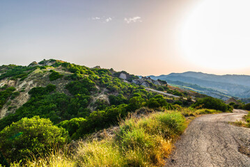 Fototapeta premium rural countryside landscape inside the badlands national Park during a sunny summer day, Val d'Agri, Basilicata