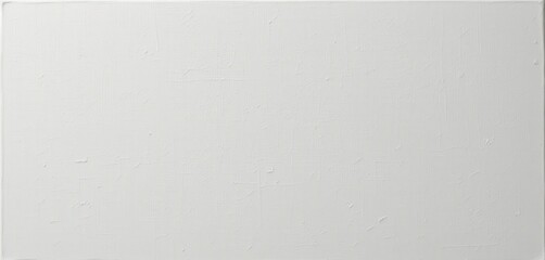 Fototapeta premium A minimalist white square painting hangs on a textured wall, its smooth surface reflecting soft light, creating a serene focal point in the room's contemporary decor.