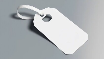 Blank white cardboard price tags with string for retail sale