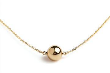 Fototapeta premium Minimalist necklace. A dainty chain showcases a polished golden sphere. Isolated against a bright white backdrop