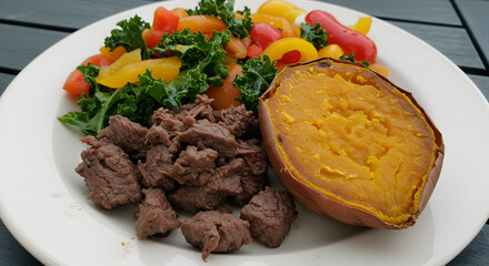 Balanced Meal Featuring Beef, Sweet Potato And Fresh Kale Salad