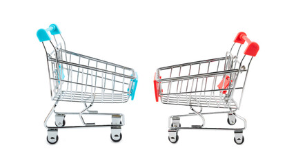 Online shopping concept.Cardboard box and shopping bags in a trolley isolated on white background....