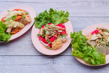 Yum food Sour and spicy flavor with ingredients of Vietnamese sausage, crab stick, minced pork, glass noodles and salad vegetables.