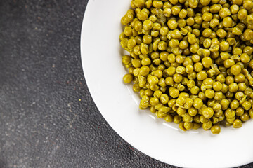 Green peas canned appetizer vegetables dish organic product fresh tasty gourmet food background on the table rustic food top view copy space keto and paleo diet vegetarian and vegan food