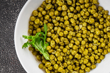 Green peas canned appetizer vegetables dish organic product fresh tasty gourmet food background on the table rustic food top view copy space keto and paleo diet vegetarian and vegan food