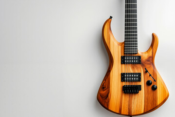 A wooden guitar with a white background