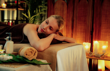 Caucasian woman customer enjoying relaxing anti-stress spa massage and pampering with beauty skin...