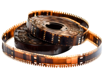 Spooled film rolls, curled in a spiral. Transparent images on the strips. Analog media for capturing moments