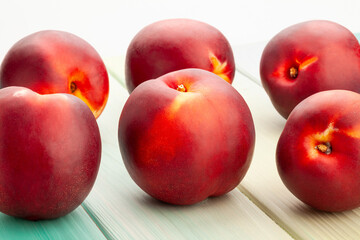 nectarine group on wood background