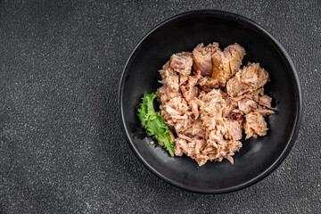 Tuna canned fish seafood appetizer dish organic product fresh tasty gourmet food background on the table rustic food top view copy space keto and paleo pescetarian diet