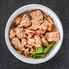 Tuna canned fish seafood appetizer dish organic product fresh tasty gourmet food background on the table rustic food top view copy space keto and paleo pescetarian diet