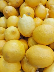 Lemons in the supermarket. Citrus.