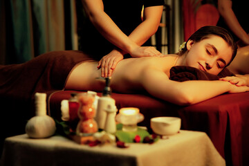 Caucasian couple customer enjoying relaxing anti-stress spa massage and pampering with beauty skin...