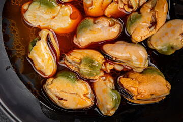 Mussels canned seafood appetizer dish organic product fresh tasty gourmet food background on the table rustic food top view copy space 