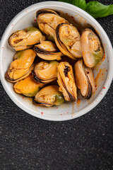 Mussels canned seafood appetizer dish organic product fresh tasty gourmet food background on the table rustic food top view copy space 