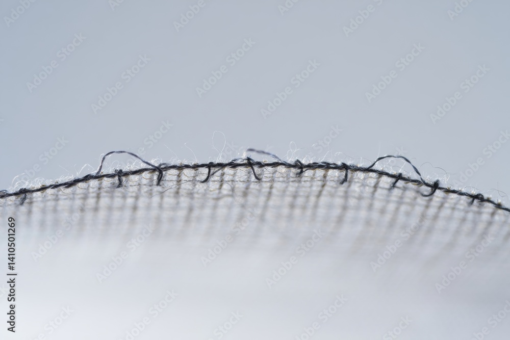 Poster close-up of delicate fabric weave and texture against soft background