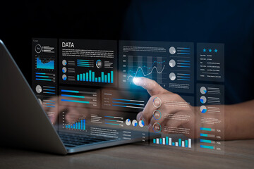 Data analysis concept, businessman using laptop to analyze business data and information management...