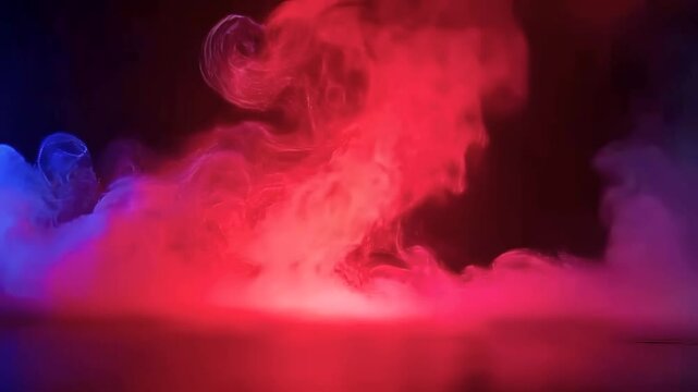 Seamless looping videos of Atmospheric vibrant red and blue vaporwave of smoke swirling, mixing, and flowing across a dark surface. Concept of abstract background and colorful effects.
