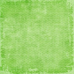 Green Zigzag chevron pattern, stripe pattern, small corners at variable angles between two parallel lines jagged and fairly regular, a decorative pattern used in fabrics, floors and paneled wood.