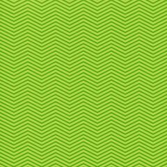 Green Zigzag chevron pattern, stripe pattern, small corners at variable angles between two parallel lines jagged and fairly regular, a decorative pattern used in fabrics, floors and paneled wood.
