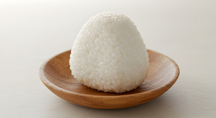 Delicious Rice Ball Onigiri Serving Traditional Japanese Food on Wooden Plate