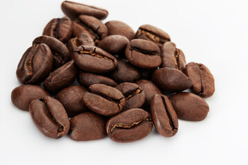 Close-Up Photograph of Pile Coffee Beans on White Background
