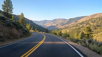 Scenic Winding Road Through Mountain Valley
